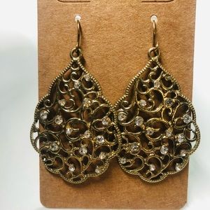 kim Rogers gold tone filigree drop earrings.